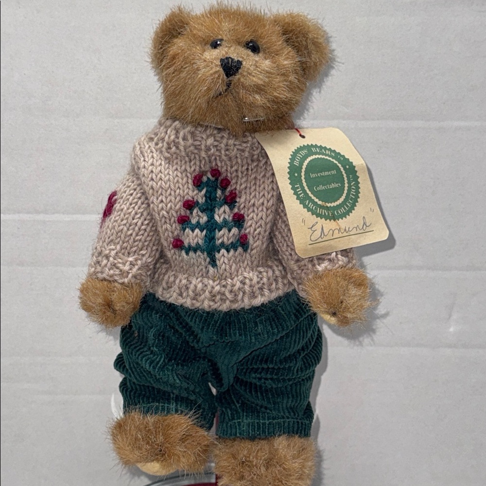 Boyds bear EDMUND wearing a tan shirt with a Christmas tree green corduroy pants